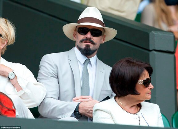Hugh Jackman in the tennis court with his new Montecristi Panama Hat by Domingo Carranza Hats